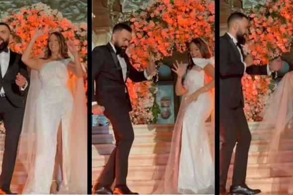 خالد عليش يرقص ويغني مع زوجته في حفل زفافهما (صور وفيديو)