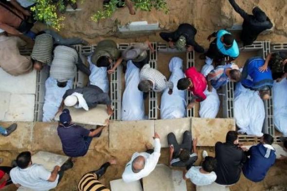 إعلام فلسطيني: انتشال جثامين 14 شهيدا في رفح الفلسطينية
